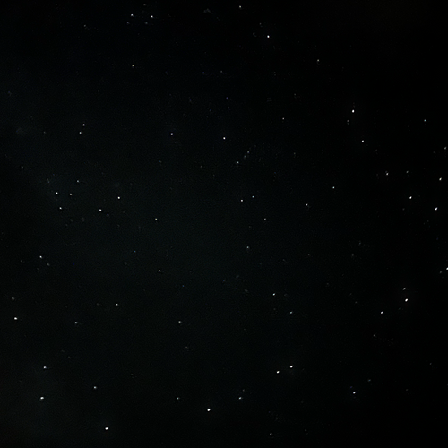 Starry night sky with a black background